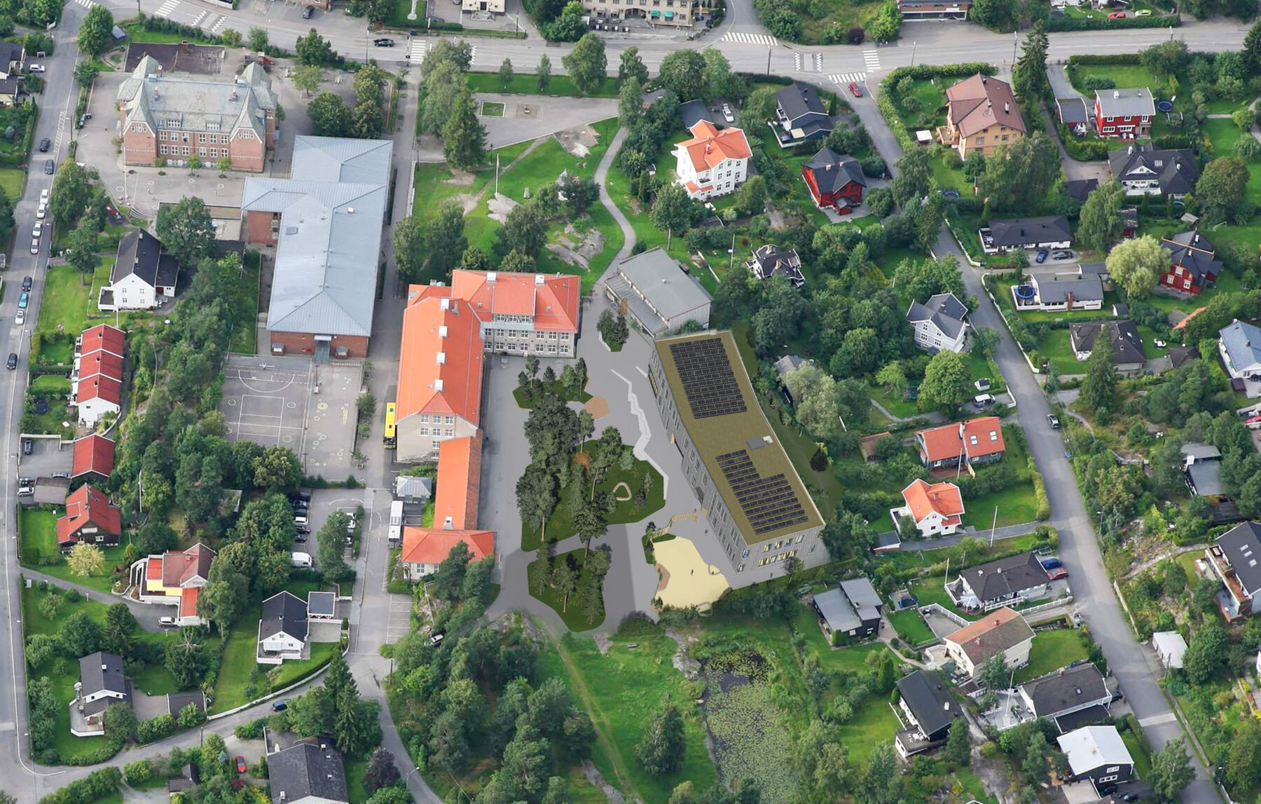 Illustrasjon av et oversiktsbilde over en skolegård med to skolebygninger på hver side.